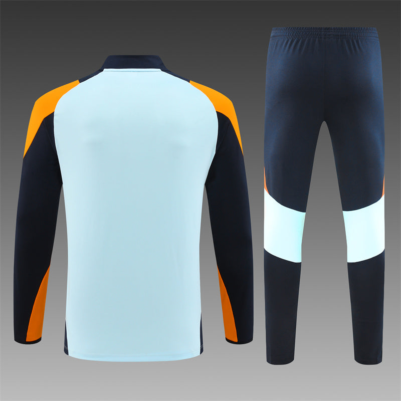 Real Madrid Tracksuit – White/Orange (Kids)